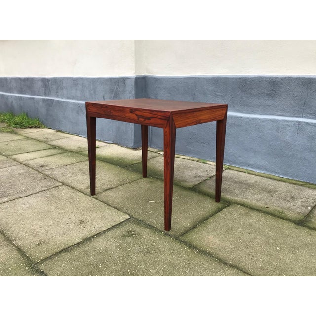Originally made as a gaming table with its concealed drawer this danish rosewood furniture demands attention with its...