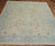 Early 20th century Persian Meshed Rug with blue and teal accents on an beige khaki ground