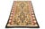 This Antique Navajo Native American Indian tribal weaving rug showcases an intricate tribal design in brown, beige, and...