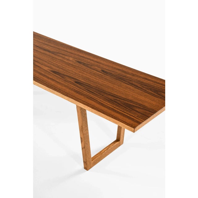 Very rare and long side table or bench designed by Kurt Østervig. Produced by Jason Møbler in Denmark. This piece is...