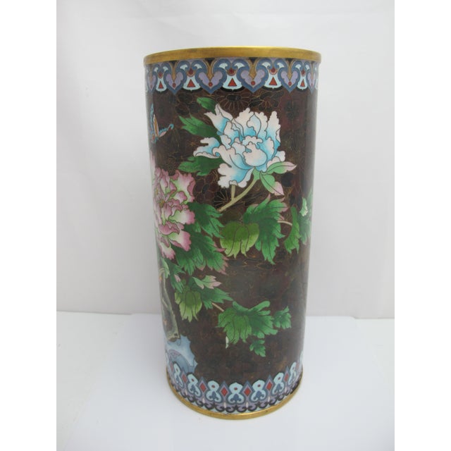 Chinese cloisonné enamel vase with cylindrical shape. Could function as a large vase or a small umbrella stand. Brass with...