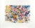 Colorful flowers fill the foreground in this large-scale watercolor still-life of a spring bouquet bursting with blossoms...