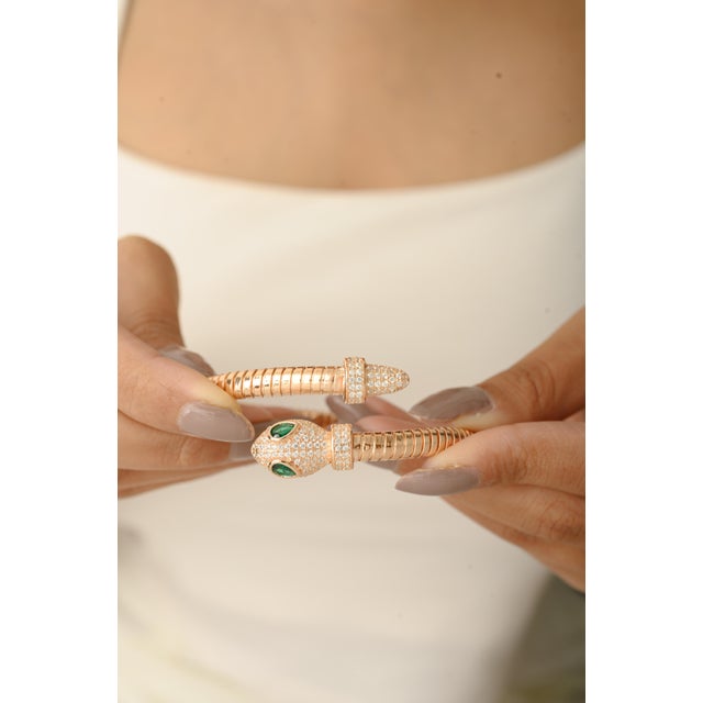 This Rose Gold Snake Bypass Flex Wrap Bracelet is beautifully crafted in 925 sterling silver and designed in an elegant...