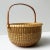 This beautifully handcrafted vintage Nantucket Lightship Basket is a signed piece, marked by the artisan on the underside....