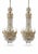 Circa 1900 Caldwell pair of unique and impressive crystals and gilt bronze chandeliers with flowers design. One chandelier...
