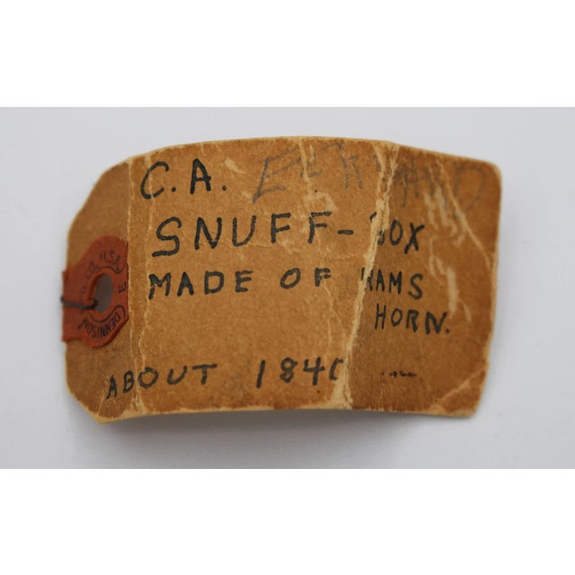 c.1800s snuff box, ram's horn with wood inset bottom. Base edge faults in the horn-top edge also. With a tag: "You God...