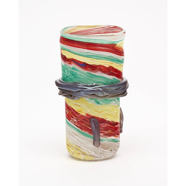 Murano glass vase, Italian, from the Island of Murano. This hand-blown glass piece is made with multicolored glass in red,...