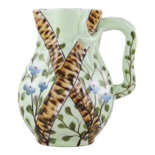 Hand-Painted Green Porcelain Pitcher With Crossed Birch and Floral Motif – Antique Farmhouse Charm For Sale