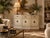 Vintage Hickory Manufacturing Co. bow-front sideboard featuring a soft cream finish, decorative paneled fronts, and ornate...