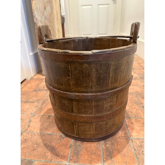 Primitive Wooden Well Bucket with Hand-Forged Central-Loop Iron Handle Description: Up for sale is a beautiful, primitive...