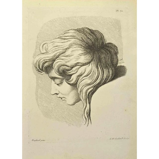 Portrait after Raphael is an etching realized by Nicholas Cochin in 1755. Signed on the plate. Good conditions. The...