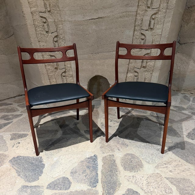 For your consideration, vintage Model 138 dining chair in teak with black upholstery, designed by Johannes Andersen for...