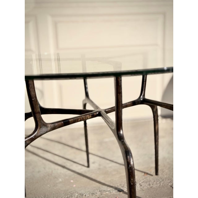 Sculptural Antique Bronzed Iron Legs Round 48” Glass Top Cyrano Dining Table by Made Goods For Sale - Image 9 of 11