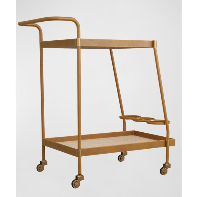 Elevate your entertaining space with the Arteriors Sanders Bar Cart, a stunning statement piece - a sophisticated design...