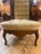 This is a vintage Lewittes cane wingback chair featuring a tufted gold velvet upholstery and intricate caning details on...