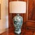A stunning Satsuma porcelain composition in turquoise and green with gilt highlights and details, the large peacock is...