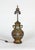An early 20th century, patinated, cast bronze and champleve enamel vase that has been converted into a lamp; in an urn...