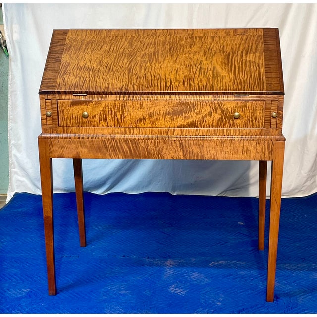 Heritage Craftsmanship Meets Radiant Artistry This bench-made drop-front secretary desk is a masterclass in traditional...