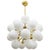 Italian sputnik chandelier with 24 glossy white Murano glass globes mounted on brass frame in unlacquered natural brass...