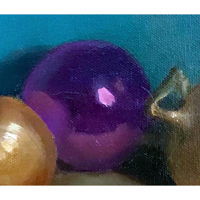 This oil painting features a still life composition of three onions and a vibrant purple ornament, set against a deep blue...