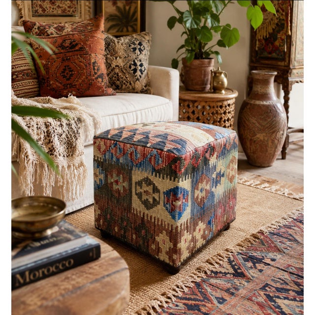 Bring warmth, color, and artisan texture to any room with this beautifully crafted kilim‑upholstered pouf. Unlike soft...