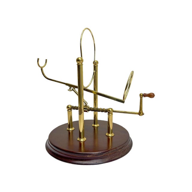 Beautiful mechanical wine decanter with holder in brass, made in France mid 20th century. The mechanical parts are made of...