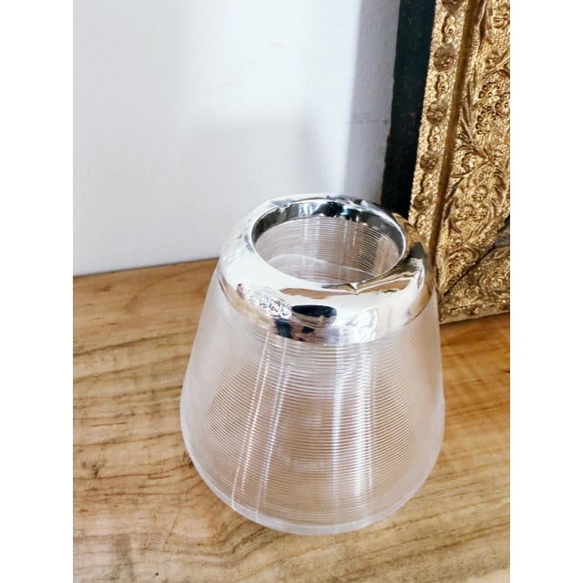 A lovely antique circa 1910 glass match striker with sterling silver rim. Excellent antique condition, just some small...