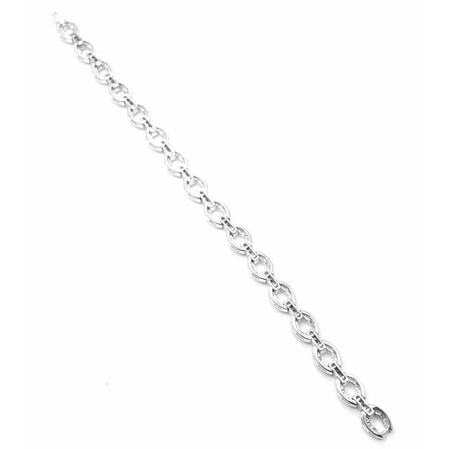 About This Piece: Retail Price: $13,400 plus tax. Metal: 18k White Gold Measurements: Weight: 18.5 grams Width: 8mm...