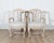 This graceful pair of Swedish Rococo armchairs embodies the refined curves and expressive craftsmanship of 18th-century...