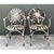 This pair of vintage Francois Carre garden chairs showcases the designer's signature sunburst motif, with circular...
