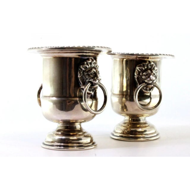 Urns in Silver with Beading Rim and Lion Heads, Set of 2, in Very Good conditions. Designed from 2000 This piece has an...
