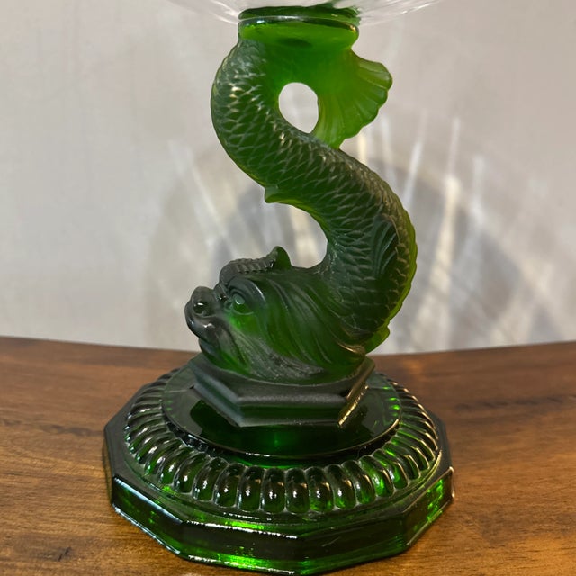 Vintage Green Glass Dolphin Base with Clear Glass Bowl. Bowl is slightly fluted. Bowl measures 10” across and about 3” deep.