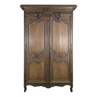 19th Century Norman Wardrobe in Carved Oak with Floral Basket Motif For Sale