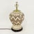 Bring warmth and character to your space with this striking vintage ceramic table lamp featuring an intricate hand-painted...