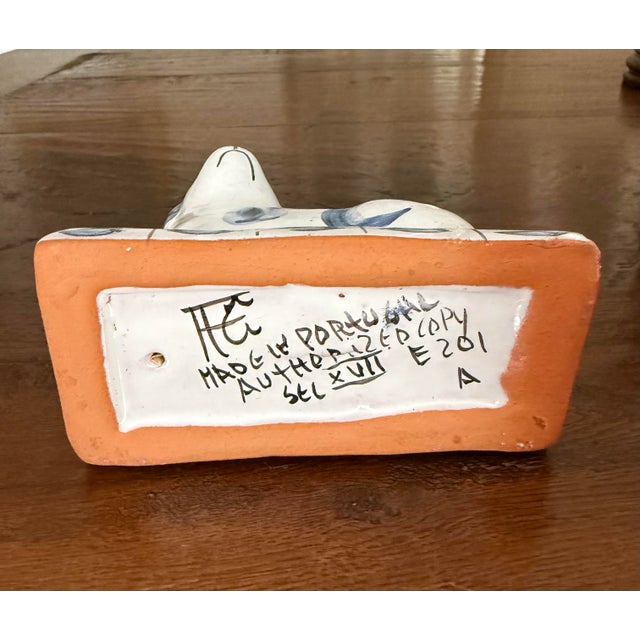 Vintage glazed terracotta figurine styled after traditional Staffordshire dogs. This lovely piece is handcrafted and hand...