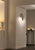 This ceramic wall light is crafted from durable stoneware, designed specifically for exterior spaces. Its minimalist yet...