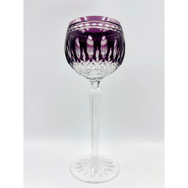 Elevate your barware collection with this elegant set of three “Clarendon” Amethyst Purple collection by Waterford Crystal...