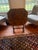 Exceptional Victorian parlor game table, circa 1850–1880, featuring a magnificent hand-worked needlepoint tilt-top...