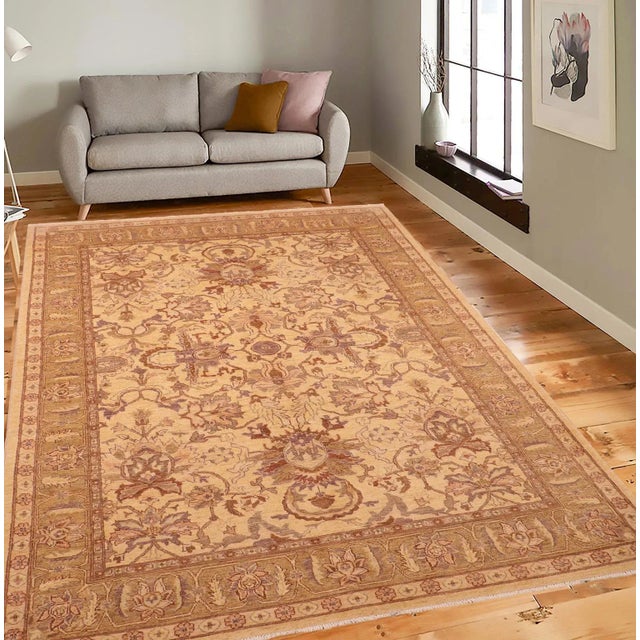"Enhance the ambiance of your home with this magnificent Persian-influenced Turkish hand-knotted rug made by skilled...