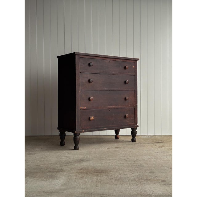 A late 19th century pine chest of drawers retaining an exceptional original painted surface worn beautifully by time and...