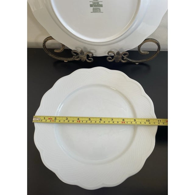 Enhance your table setting with this elegant set of four vintage Dansk dinner plates from the sought-after Franks...