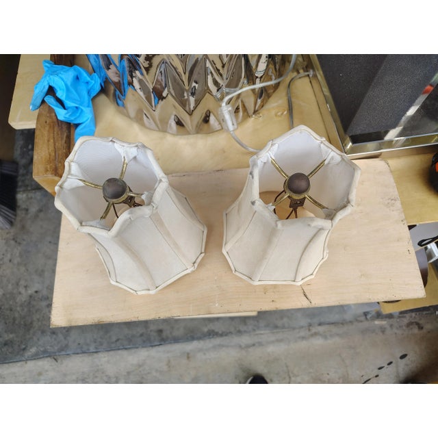 This eggshell white pair of shades work well in bedrooms and hallways they are scalloped and have interesting pointed ends...