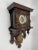 a wall clock *Antique wall clock regulator *richly decorated *with pendulum *mechanical clockwork *with gong *according to...
