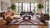 Elevate high-end interiors with this striking contemporary flat-weave wool rug, featuring classic Navajo-inspired regional...