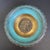 A vintage Oppenheim brass candy fruit bowl, featuring a rich verdigris enamel finish and a hammered repoussé design of...