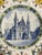 Limited edition hand-painted Royal Delft / De Porceleyne Fles wall plate, made in 1975 for Monumentenjaar. The centre...
