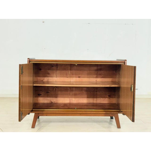 Beautifully designed vintage chest of drawers in a timeless style. The piece is in very good, well-maintained condition. A...