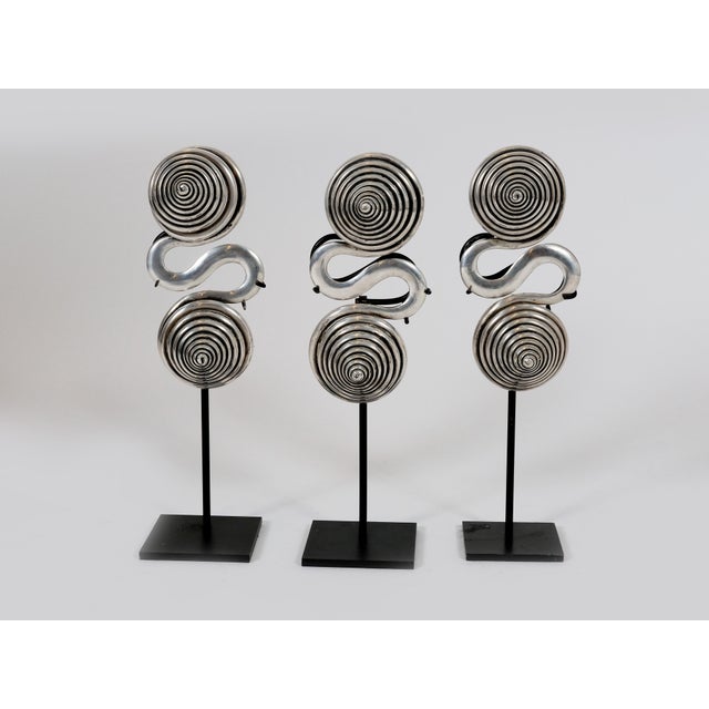 Offered is a set of 3 handcrafted coiled and spiraled sterling silver S-shaped cones (or conical counterwights) that have...