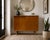 Danish Mid Century Modern Oak Jr. Credenza / Storage Cabinet, c. 1960's. This piece is highlighted by some incredible...