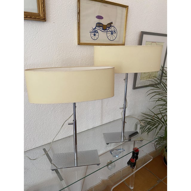 Pair of designer table lamps, Dune collection, by Jean-Paul Marzais, 2004. This lamp features a telescopic base with a...